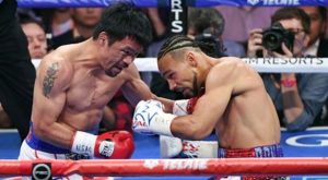 Boxeo: Pacquiao vence a Thurman y captura cetro wélter