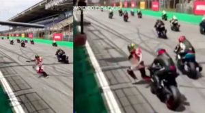 Piloto de moto cae sobre la pista de carrera y ocurre un milagro