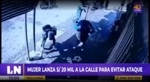 Mujer lanza 20 mil soles a la calle para evitar que le hagan daño