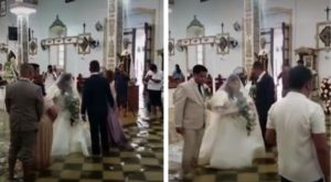 Pareja se casa en iglesia inundada tras tifón