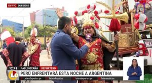 Hincha vestido de Inca reparte comida pagada por jeque